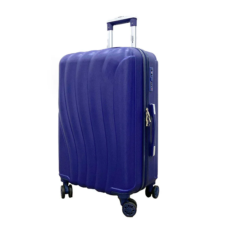 Comment la texture nervurée des bagages en ABS améliore-t-elle la résistance aux rayures et masque-t-elle l'usure de la surface ?